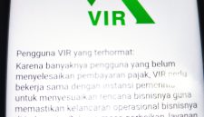 Tangkapan layar aplikasi VIR Indonesia. Setiap kali anggota berusaha melakukan penarikan dana, muncul pemberitahuan ini. Foto :tangkapan layar yang dikirimkan korban